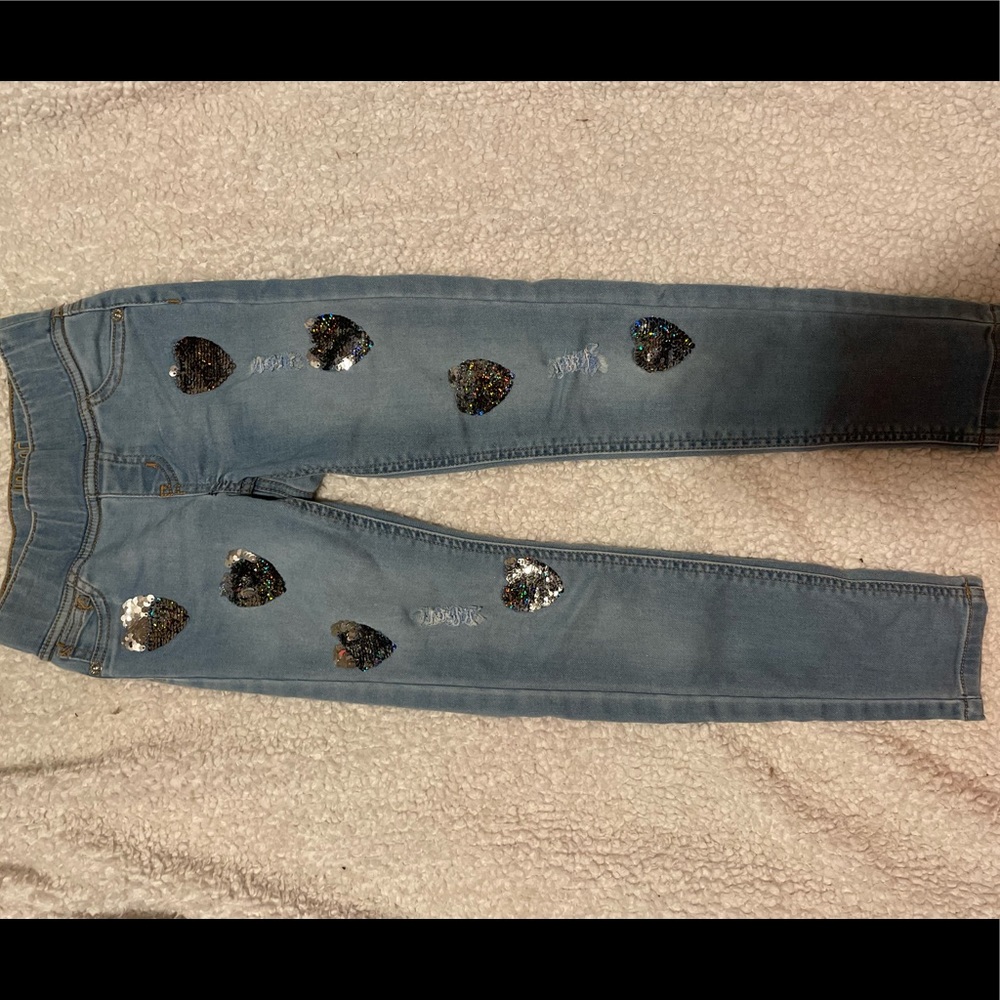 Girls light blue justice jeans with sequin hearts